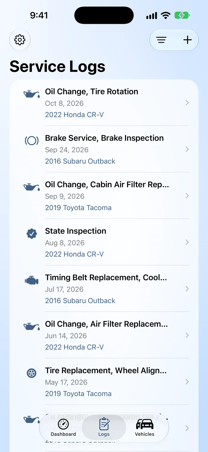 GreaseNote iPhone app service log listing oil changes, brake service and inspections across three vehicles